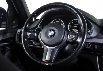 Подержанный автомобиль BMW X6 2016 года (13 фото)