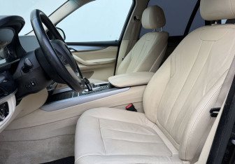 Подержанный автомобиль BMW X5 2015 года (10 фото)