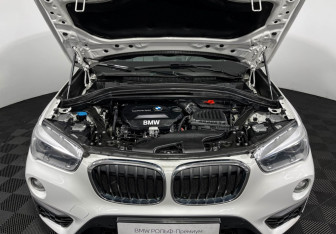 Подержанный автомобиль BMW X1 2018 года (10 фото)