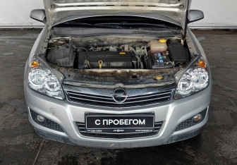 Подержанный автомобиль Opel Astra Wagon 2007 года (17 фото)