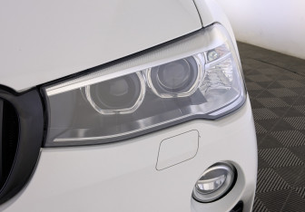 Подержанный автомобиль BMW X4 2015 года (11 фото)