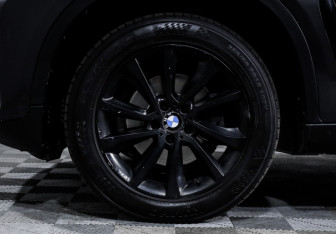 Подержанный автомобиль BMW X6 2016 года (15 фото)