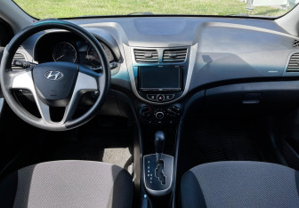 Подержанный автомобиль Hyundai Solaris Sedan 2013 года (13 фото)