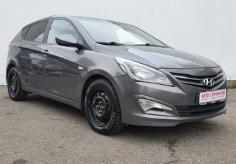 Подержанный автомобиль Hyundai Solaris Hatchback 2014 года (3 фото)