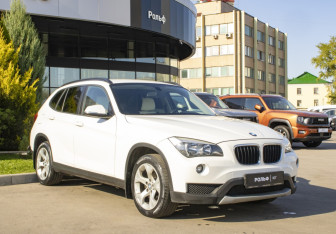 Подержанный автомобиль BMW X1 2014 года (3 фото)