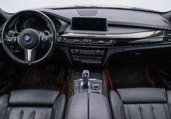 Подержанный автомобиль BMW X5 2016 года (13 фото)
