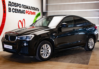 Подержанный автомобиль BMW X4 2015 года (1 фото)