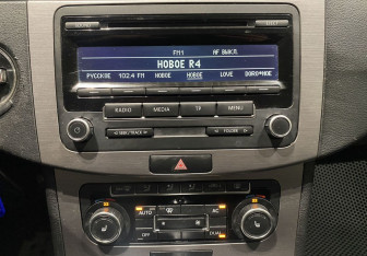 Подержанный автомобиль Volkswagen Passat Sedan 2011 года (14 фото)