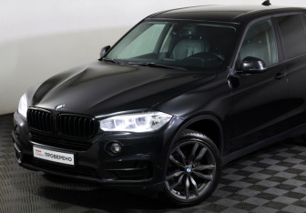 Подержанный автомобиль BMW X5 2014 года (23 фото)