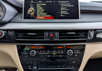 Подержанный автомобиль BMW X5 2014 года (15 фото)