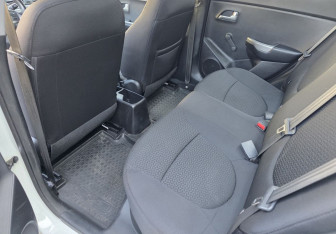 Подержанный автомобиль Kia Rio Sedan 2016 года (10 фото)