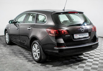 Подержанный автомобиль Opel Astra Wagon 2014 года (7 фото)