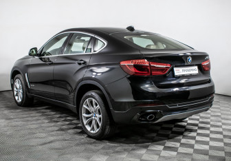 Подержанный автомобиль BMW X6 2016 года (7 фото)