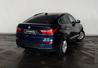 Подержанный автомобиль BMW X4 2015 года (4 фото)