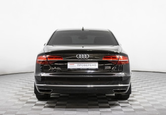 Подержанный автомобиль Audi A8 2014 года (6 фото)