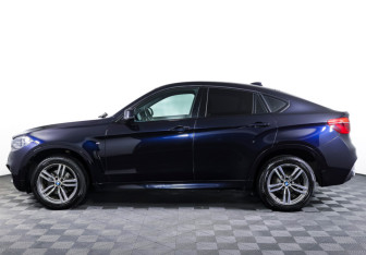 Подержанный автомобиль BMW X6 2016 года (8 фото)