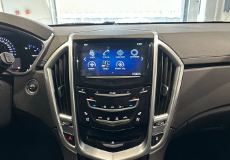 Подержанный автомобиль Cadillac SRX 2013 года (16 фото)