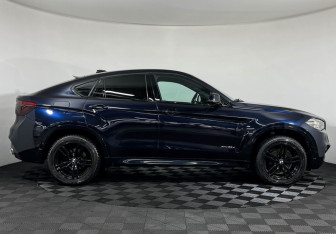 Подержанный автомобиль BMW X6 2018 года (6 фото)