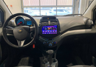Подержанный автомобиль Chevrolet Spark 2012 года (9 фото)