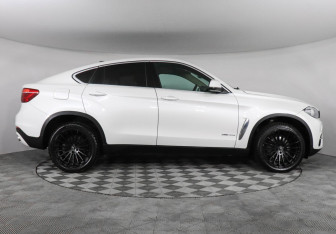 Подержанный автомобиль BMW X6 2015 года (6 фото)