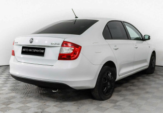Подержанный автомобиль Skoda Rapid Liftback 2015 года (3 фото)