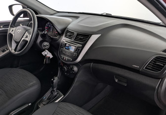 Подержанный автомобиль Hyundai Solaris Sedan 2016 года (13 фото)