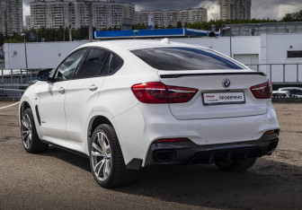 Подержанный автомобиль BMW X6 2017 года (7 фото)