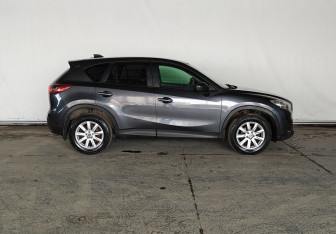 Подержанный автомобиль Mazda CX-5 2013 года (8 фото)