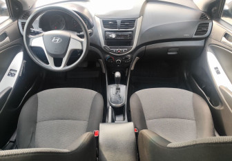Подержанный автомобиль Hyundai Solaris Hatchback 2014 года (10 фото)