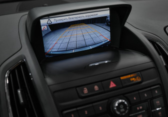 Подержанный автомобиль Opel Zafira Minivan 2013 года (21 фото)