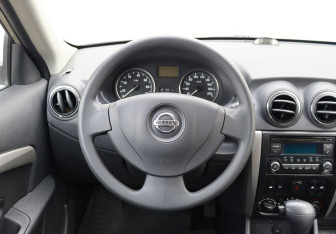 Подержанный автомобиль Nissan Almera Sedan 2014 года (14 фото)