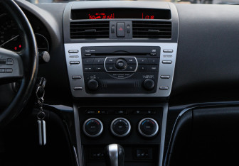 Подержанный автомобиль Mazda 6 Liftback 2008 года (10 фото)