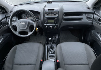 Подержанный автомобиль Kia Sportage 2009 года (9 фото)