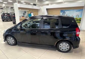 Подержанный автомобиль Honda Jazz 2008 года (8 фото)