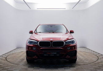Подержанный автомобиль BMW X6 2015 года (8 фото)