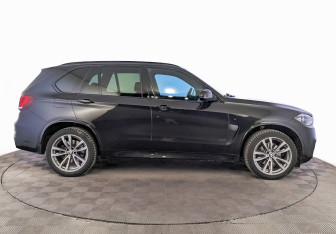 Подержанный автомобиль BMW X5 2015 года (4 фото)