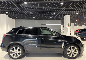 Подержанный автомобиль Cadillac SRX 2011 года (4 фото)