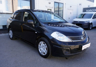 Подержанный автомобиль Nissan Tiida Sedan 2011 года (3 фото)