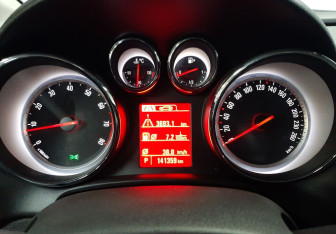 Подержанный автомобиль Opel Astra Hatchback 2013 года (14 фото)