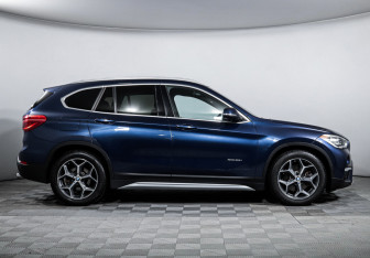 Подержанный автомобиль BMW X1 2015 года (4 фото)