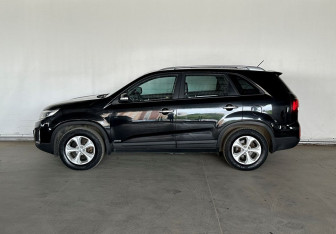 Подержанный автомобиль Kia Sorento 2013 года (8 фото)