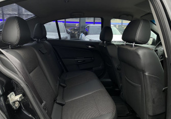 Подержанный автомобиль Opel Astra Sedan 2012 года (19 фото)