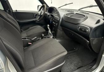 Подержанный автомобиль Chevrolet Niva 2014 года (13 фото)