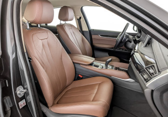 Подержанный автомобиль BMW X6 2018 года (24 фото)