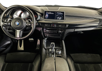 Подержанный автомобиль BMW X6 2016 года (12 фото)
