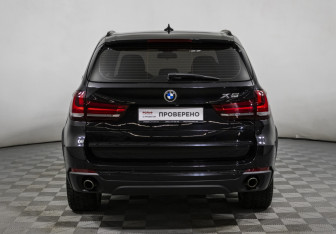 Подержанный автомобиль BMW X5 2014 года (6 фото)