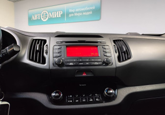 Подержанный автомобиль Kia Sportage 2012 года (17 фото)