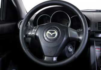 Подержанный автомобиль Mazda 3 Sedan 2006 года (13 фото)