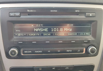 Подержанный автомобиль Skoda Octavia Liftback 2011 года (15 фото)