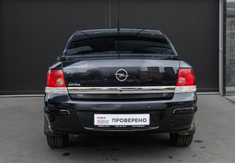 Подержанный автомобиль Opel Astra Sedan 2010 года (5 фото)